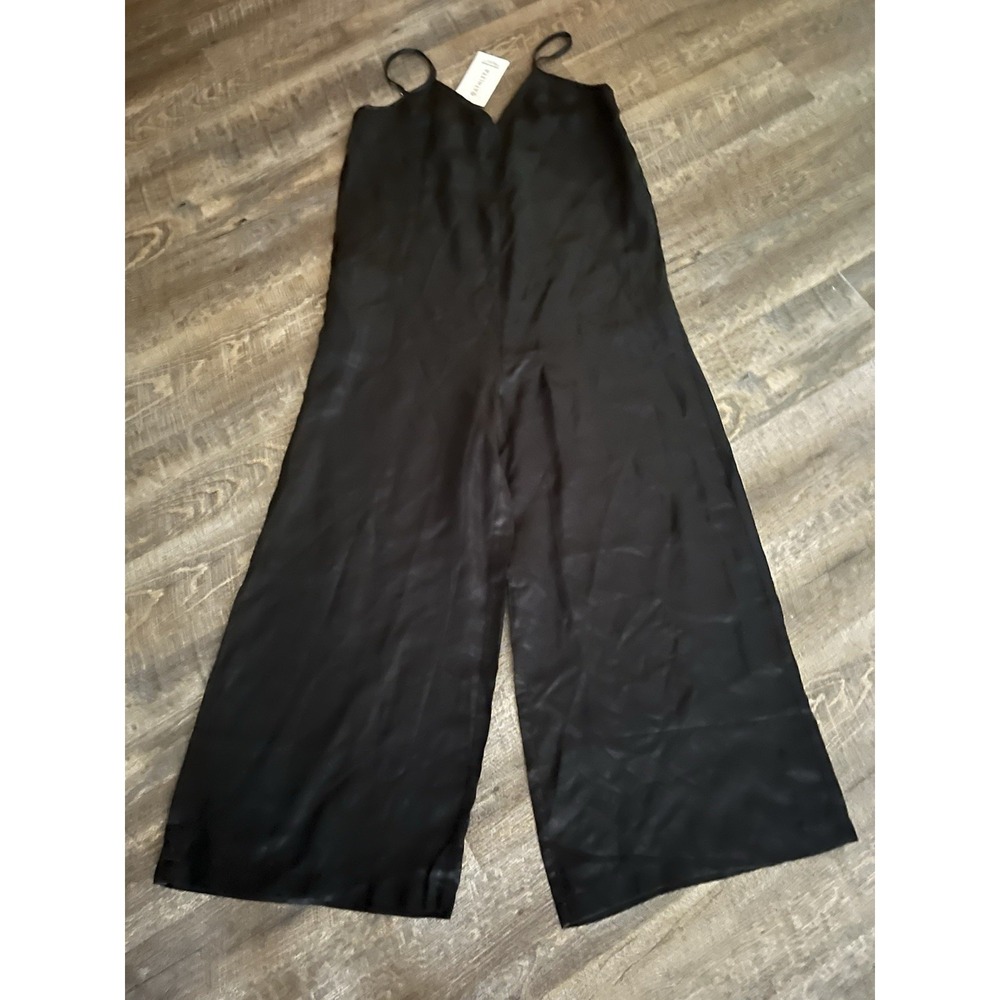 Athleta black Calm Cool Romper. Super soft satin, 28" inseam, Size Medium NWT